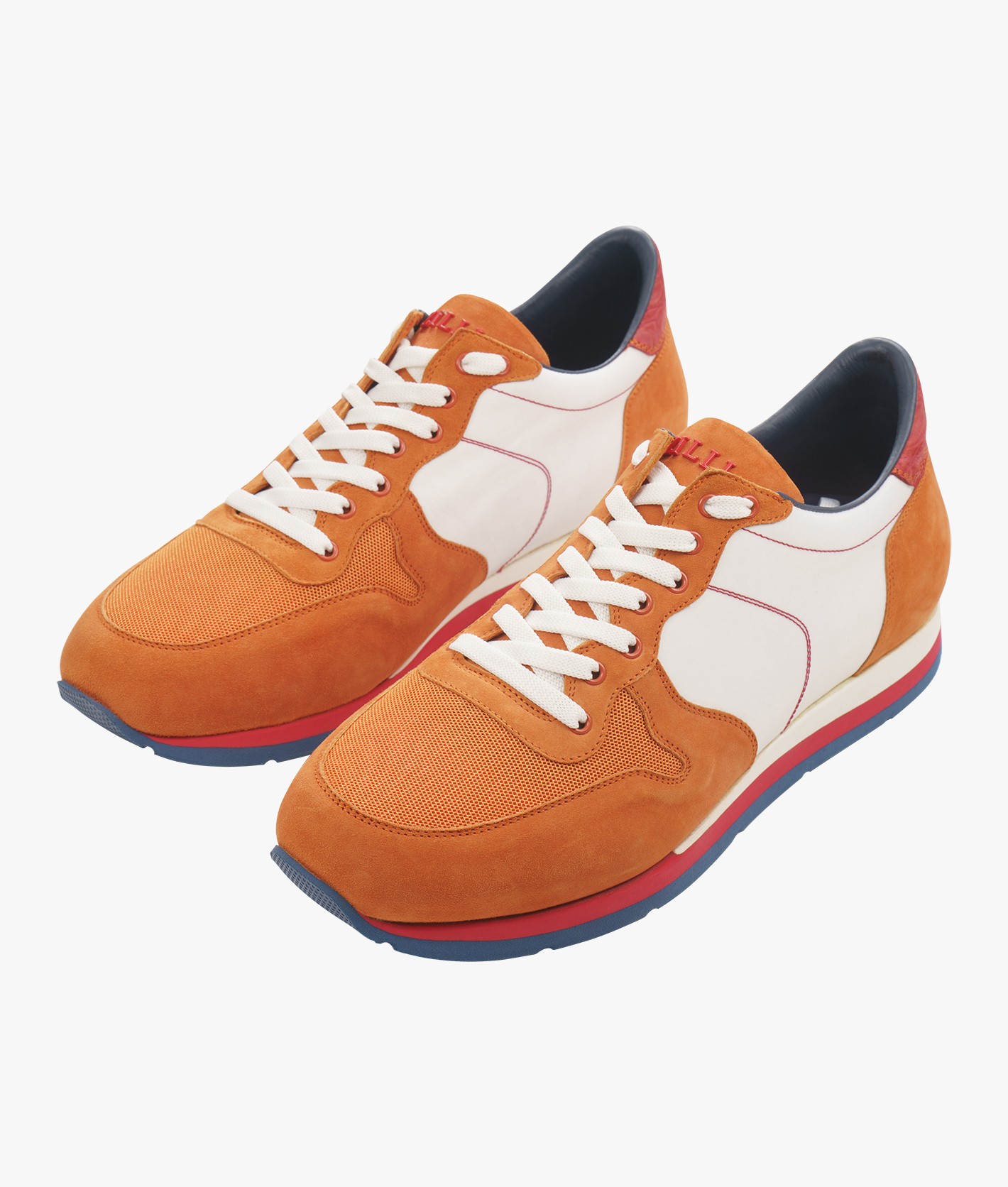 White and orange run sneakers