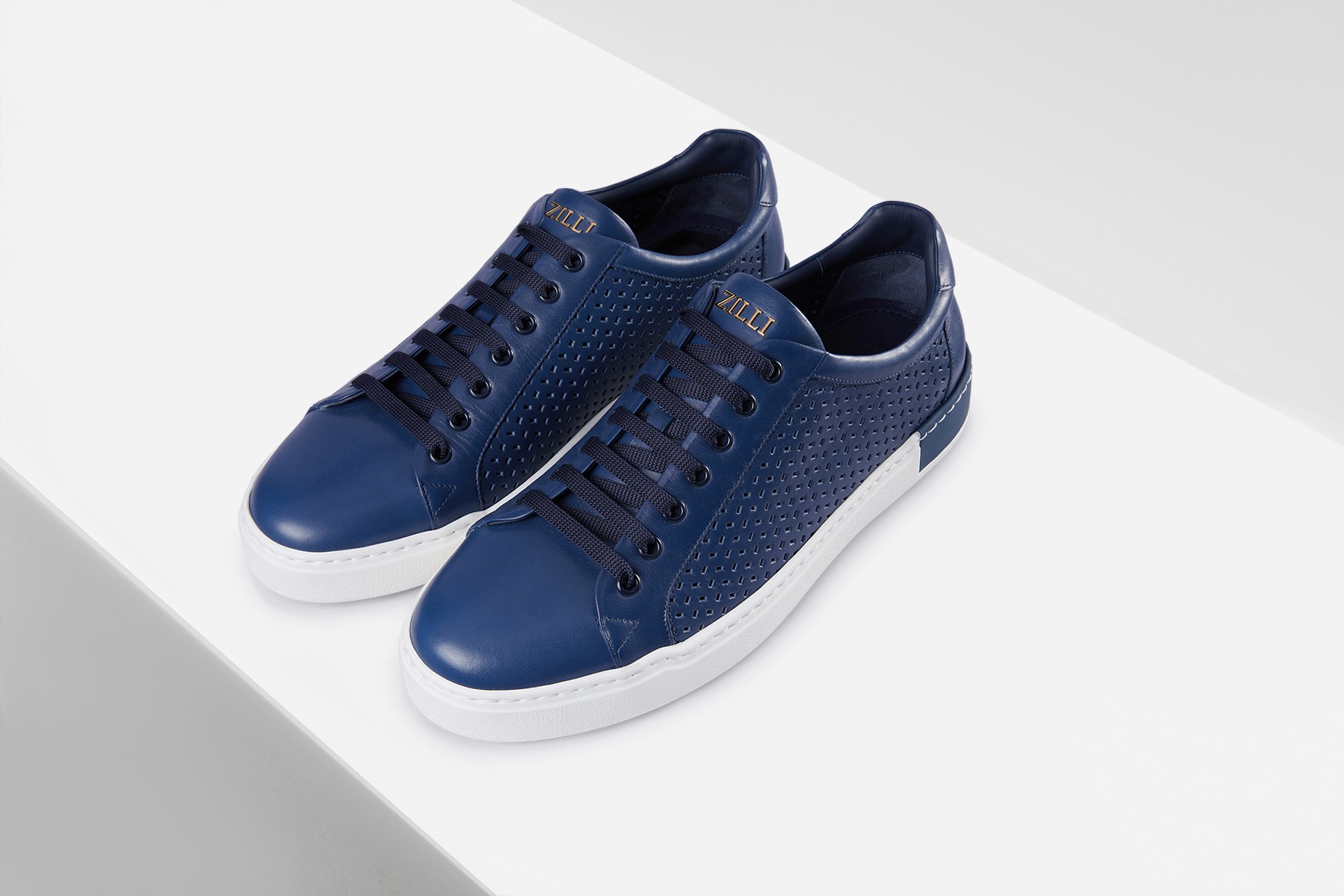 Royal blue sneakers in calfskin and perforated calfskin