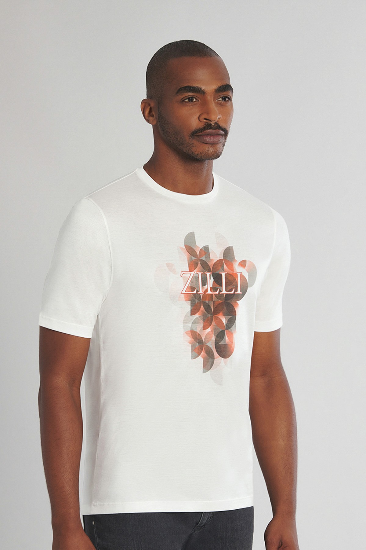 Ecru T-shirt, orange and grey Pop Art pattern